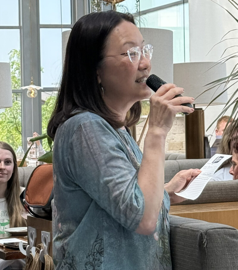Managing Partner Sharon Montanye speaks to staff at a 30th anniversary celebration
